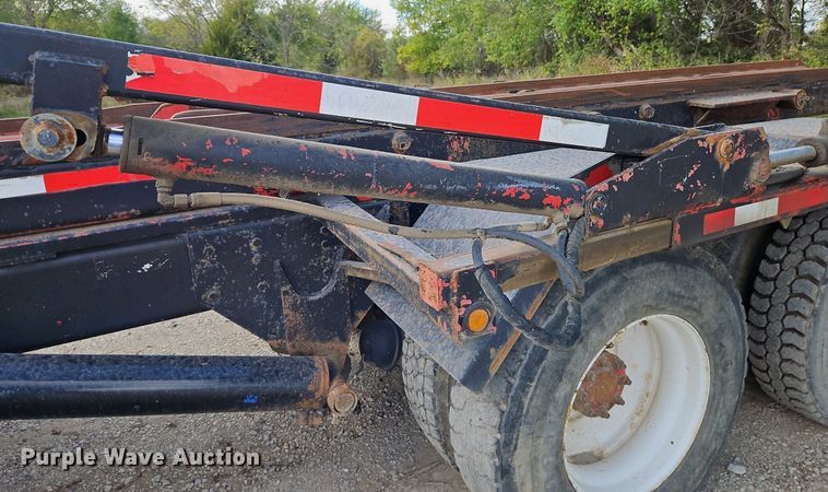 image for item DP2480 1999 Volvo WG64  roll-off container truck