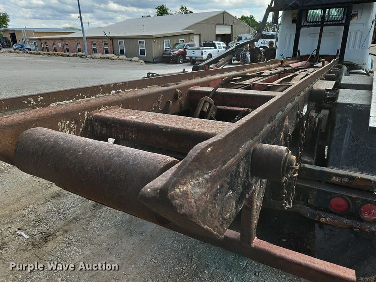 image for item DP2480 1999 Volvo WG64  roll-off container truck