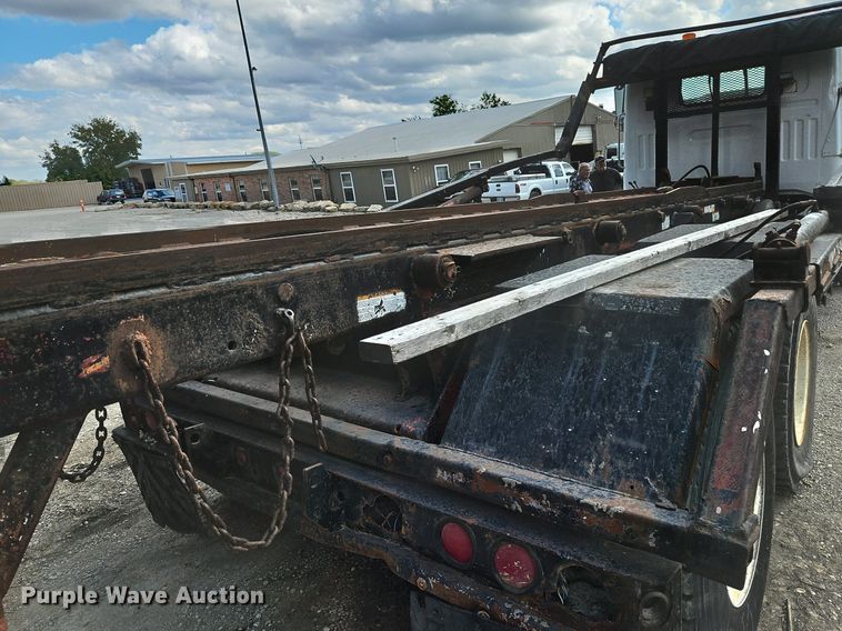 image for item DP2480 1999 Volvo WG64  roll-off container truck