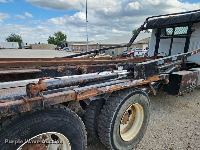 image for item DP2480 1999 Volvo WG64  roll-off container truck