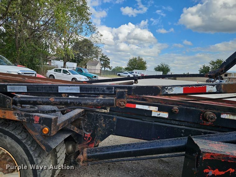 image for item DP2480 1999 Volvo WG64  roll-off container truck