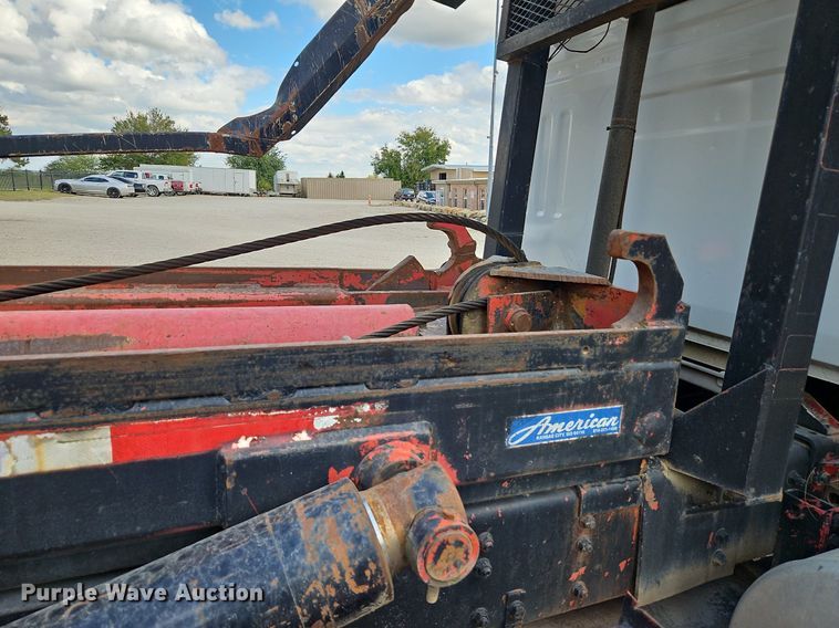 image for item DP2480 1999 Volvo WG64  roll-off container truck