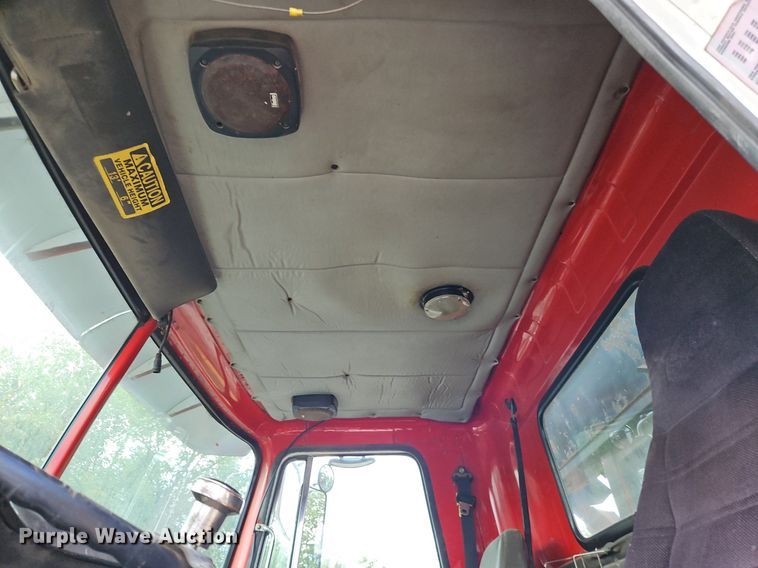 image for item DP2480 1999 Volvo WG64  roll-off container truck