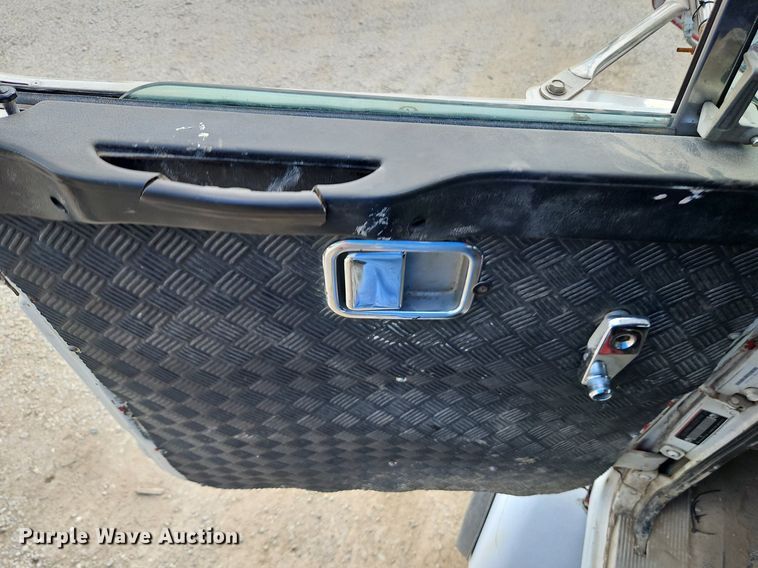 image for item DP2480 1999 Volvo WG64  roll-off container truck