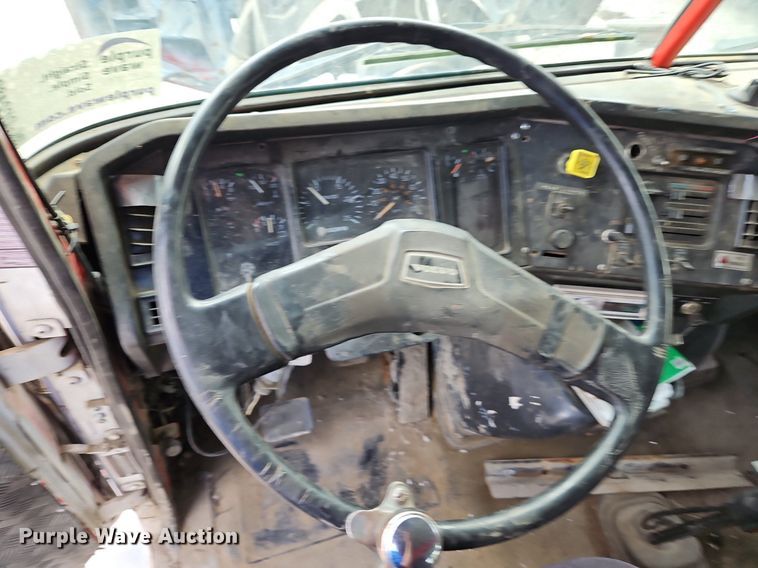 image for item DP2480 1999 Volvo WG64  roll-off container truck