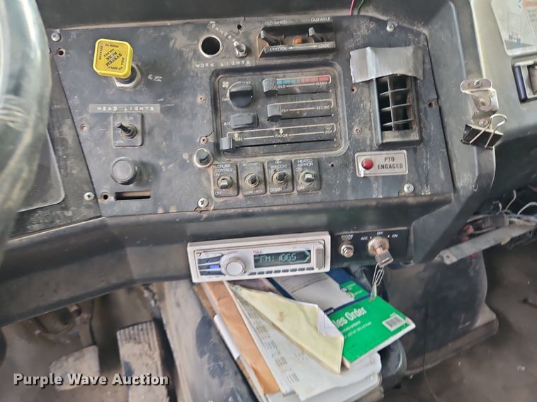 image for item DP2480 1999 Volvo WG64  roll-off container truck