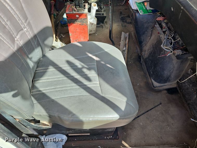 image for item DP2480 1999 Volvo WG64  roll-off container truck