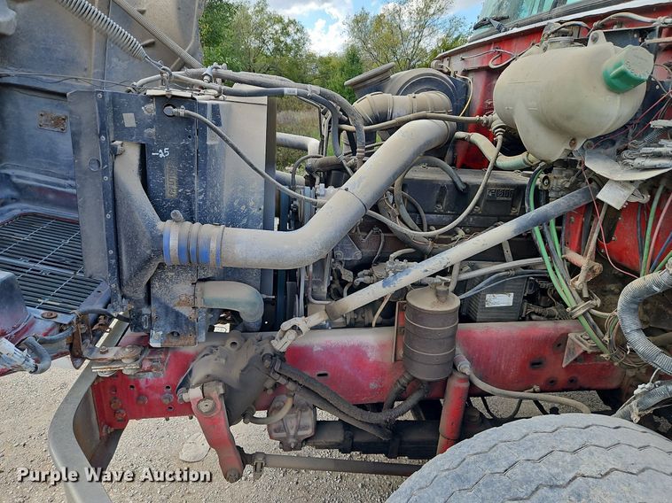 image for item DP2480 1999 Volvo WG64  roll-off container truck