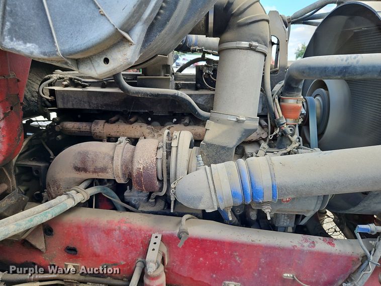 image for item DP2480 1999 Volvo WG64  roll-off container truck