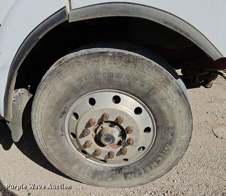 image for item DP2480 1999 Volvo WG64  roll-off container truck