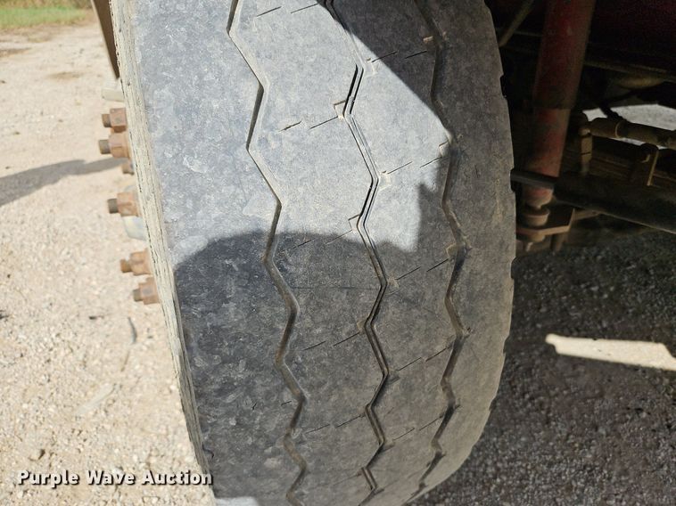 image for item DP2480 1999 Volvo WG64  roll-off container truck