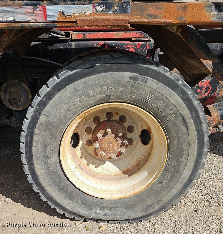 image for item DP2480 1999 Volvo WG64  roll-off container truck