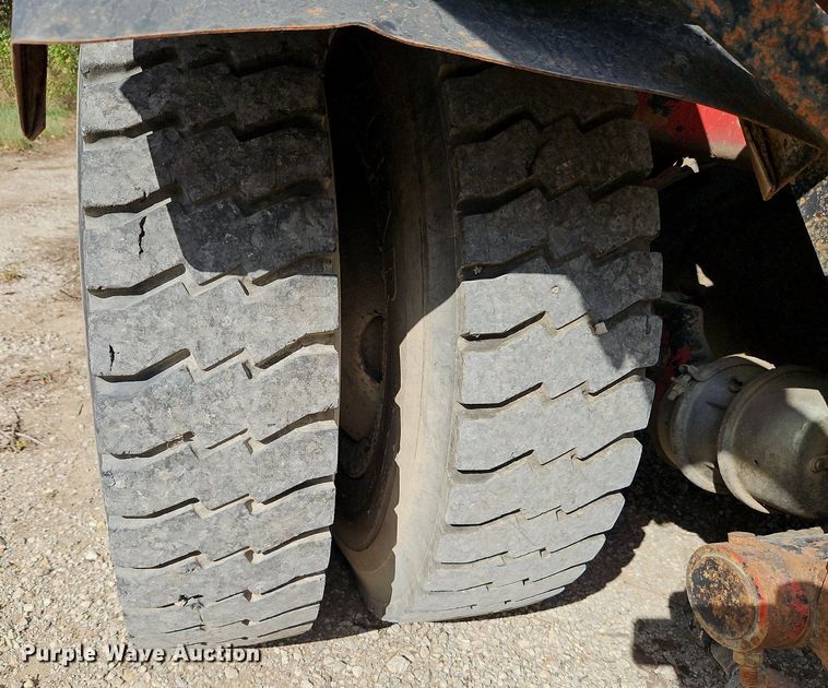 image for item DP2480 1999 Volvo WG64  roll-off container truck