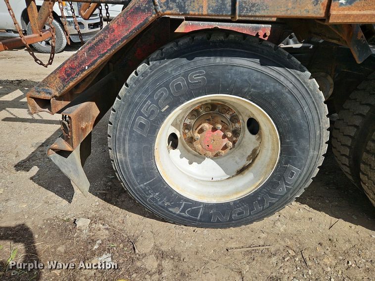 image for item DP2480 1999 Volvo WG64  roll-off container truck