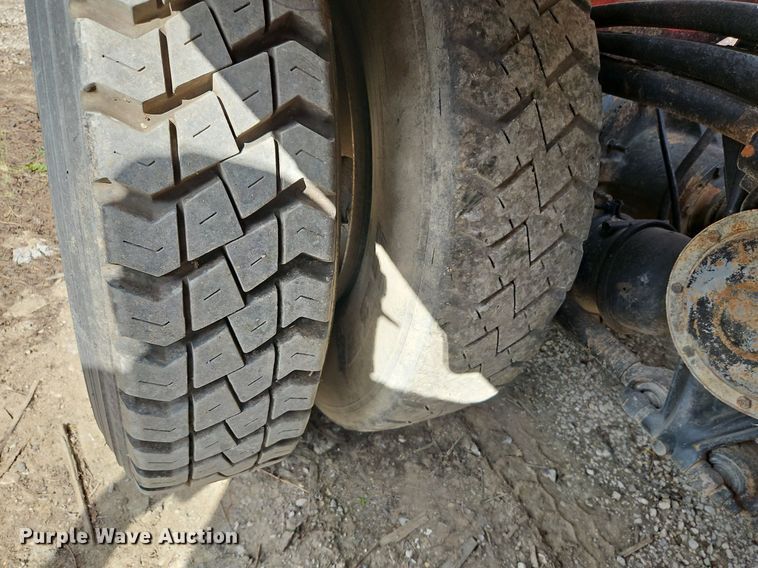 image for item DP2480 1999 Volvo WG64  roll-off container truck