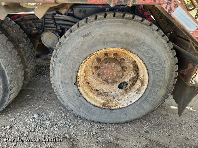 image for item DP2480 1999 Volvo WG64  roll-off container truck