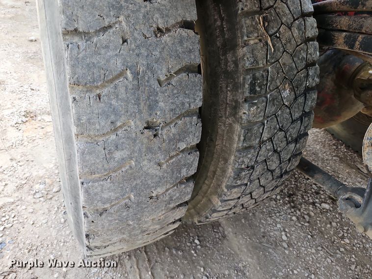 image for item DP2480 1999 Volvo WG64  roll-off container truck