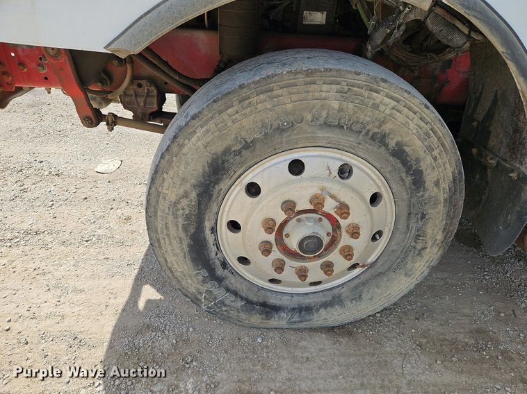 image for item DP2480 1999 Volvo WG64  roll-off container truck