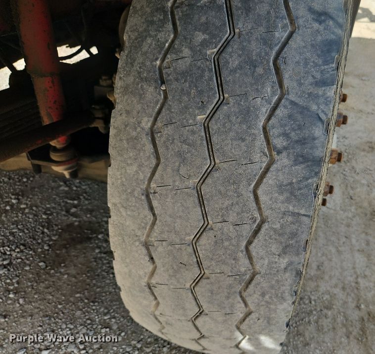 image for item DP2480 1999 Volvo WG64  roll-off container truck