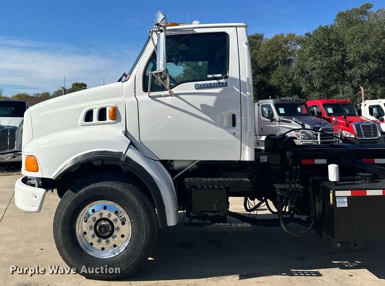 image for item MQ9509 1998 Ford  Louisville roll-off container truck