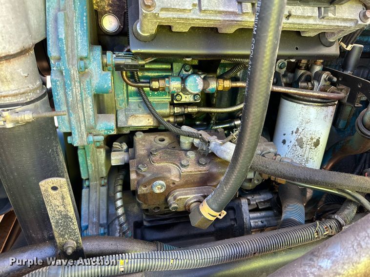 image for item DQ1495 2000 International 4700  pothole patcher truck