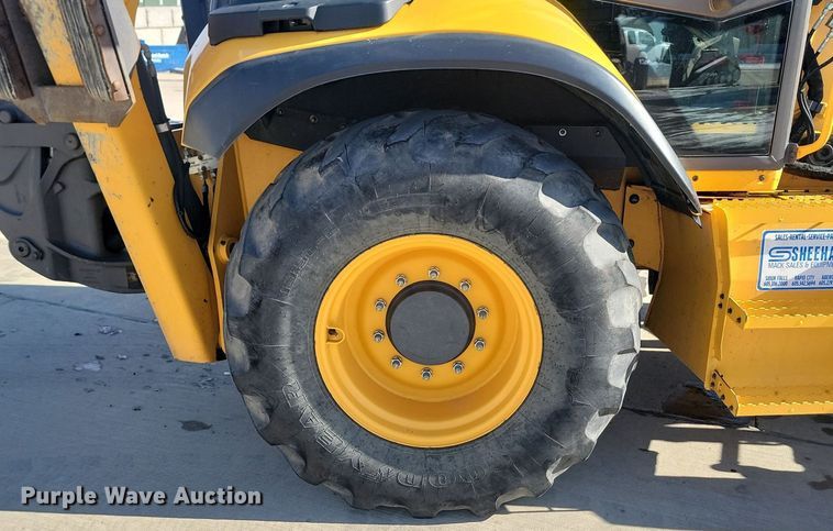 image for item JG9657 2014 Volvo BL70B  backhoe