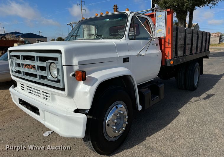 image for item GQ9220 1984 GMC C6000  dump flatbed truck