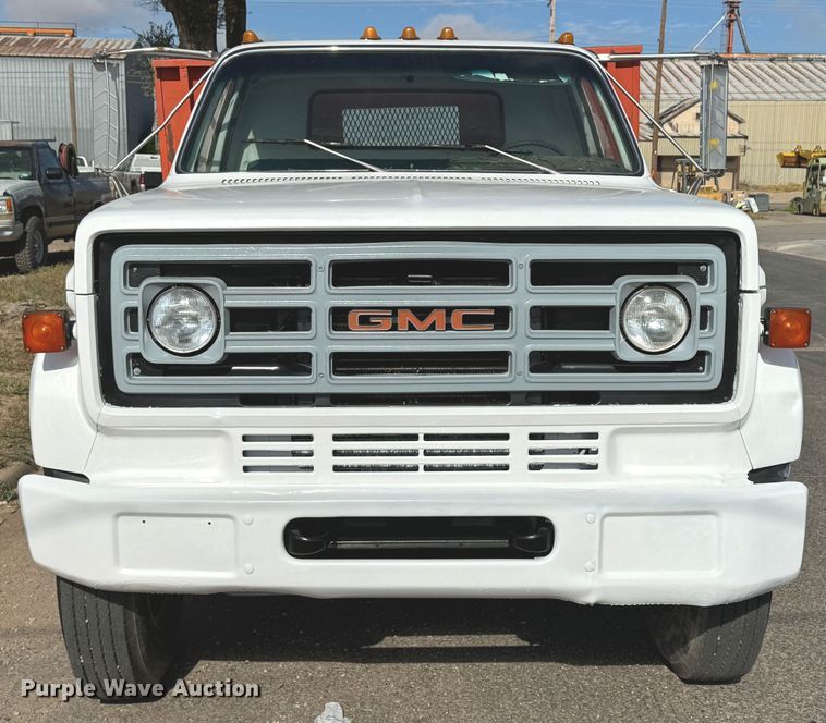 image for item GQ9220 1984 GMC C6000  dump flatbed truck