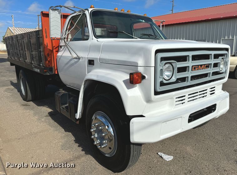 image for item GQ9220 1984 GMC C6000  dump flatbed truck