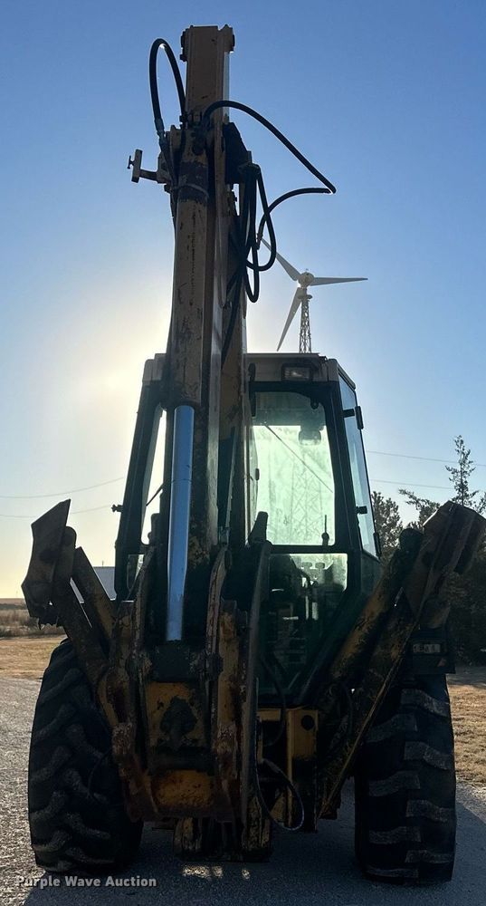 image for item IU9092 1993 Ford New Holland 555D  backhoe