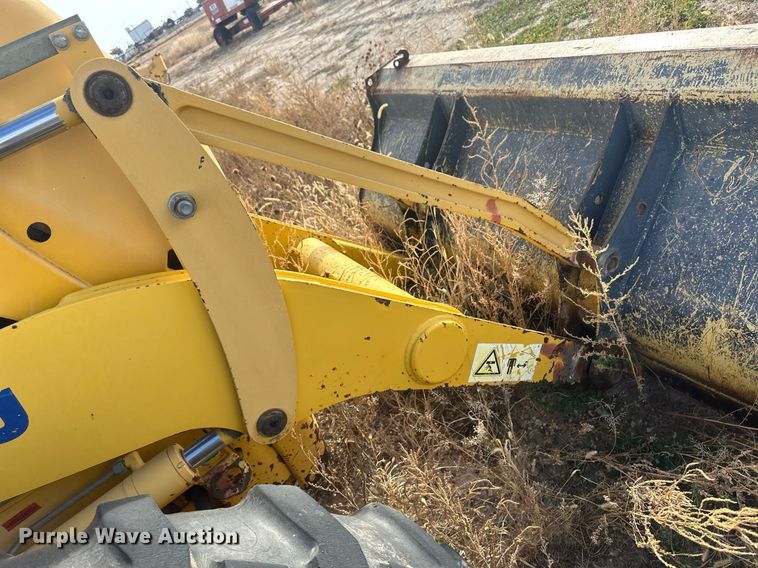 image for item IU9099 2003 Komatsu WB150AWS  backhoe