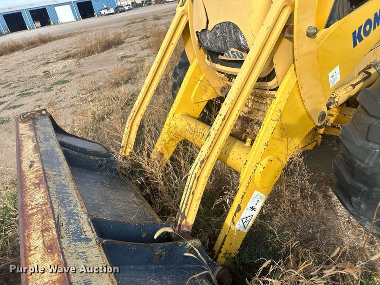 image for item IU9099 2003 Komatsu WB150AWS  backhoe