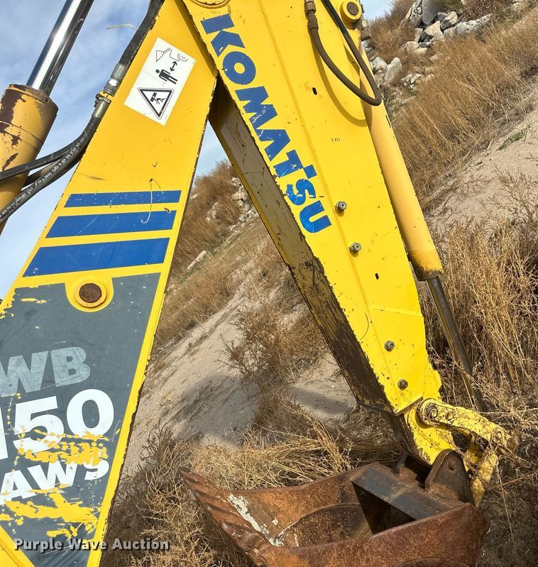 image for item IU9099 2003 Komatsu WB150AWS  backhoe