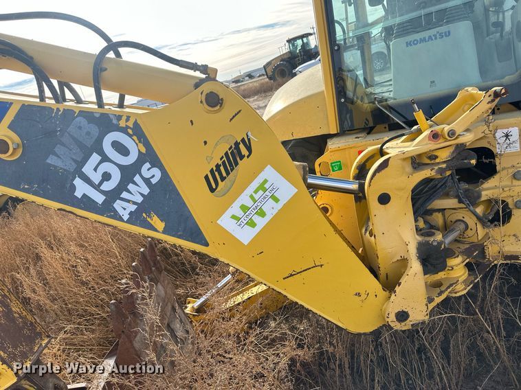 image for item IU9099 2003 Komatsu WB150AWS  backhoe