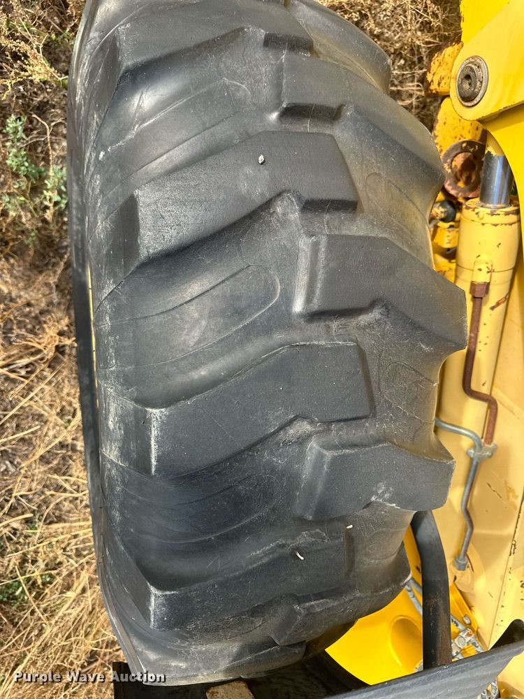 image for item IU9099 2003 Komatsu WB150AWS  backhoe