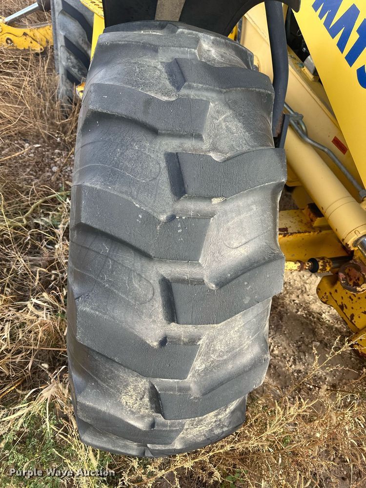 image for item IU9099 2003 Komatsu WB150AWS  backhoe