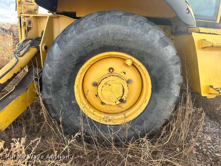 image for item IU9099 2003 Komatsu WB150AWS  backhoe