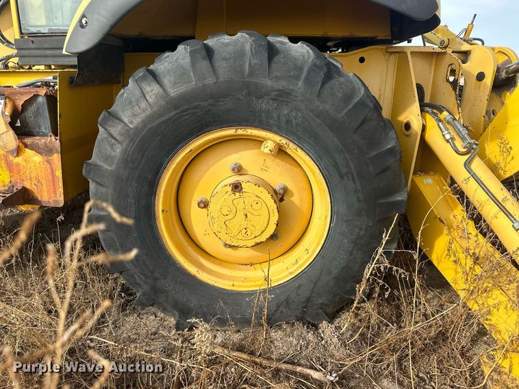 image for item IU9099 2003 Komatsu WB150AWS  backhoe