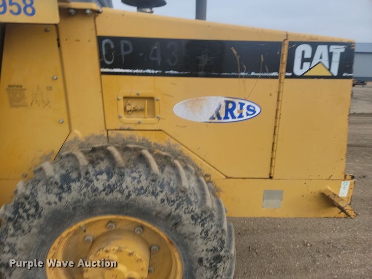 image for item JG9617 1998 Caterpillar CP-433C  single drum vibratory roller