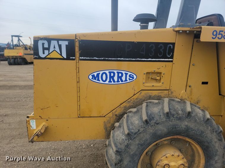 image for item JG9617 1998 Caterpillar CP-433C  single drum vibratory roller