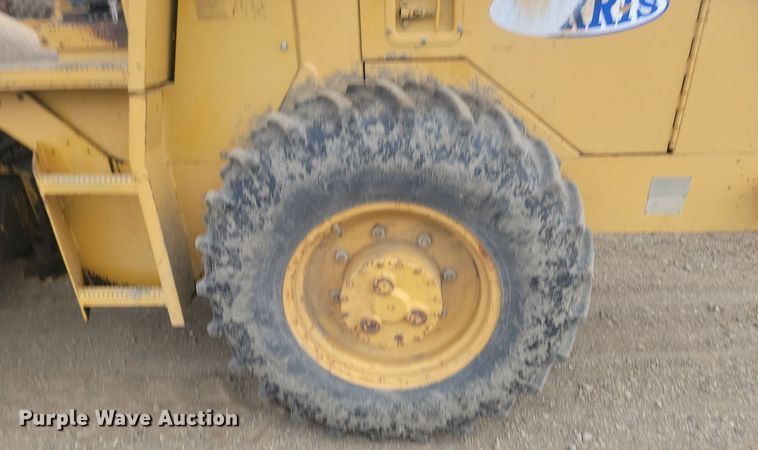 image for item JG9617 1998 Caterpillar CP-433C  single drum vibratory roller