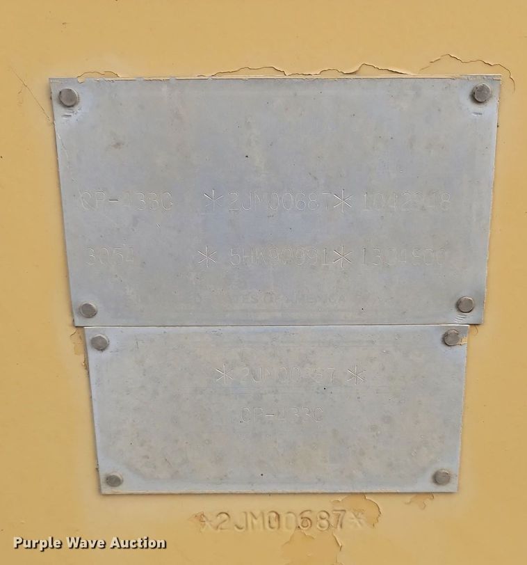 image for item JG9617 1998 Caterpillar CP-433C  single drum vibratory roller