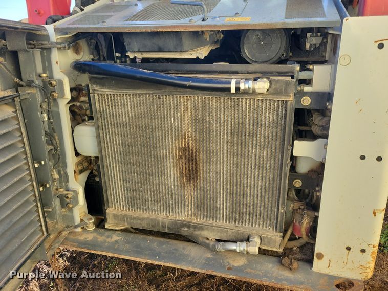 image for item JG9636 2017 Takeuchi TL10V2  skid steer loader