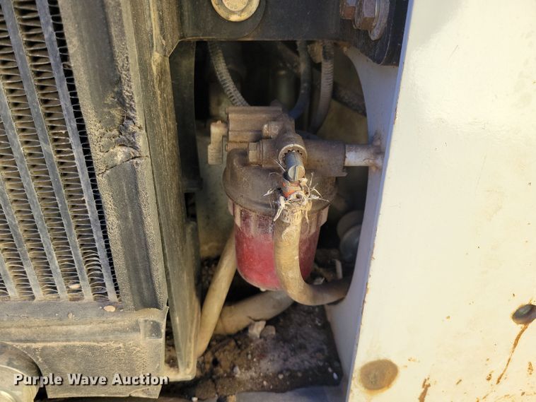 image for item JG9636 2017 Takeuchi TL10V2  skid steer loader