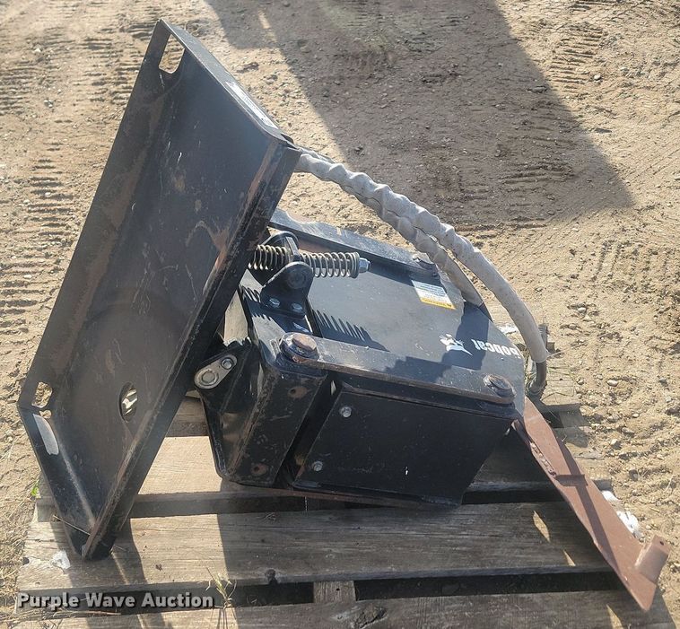 image for item JG9653 Bobcat  compact utility loader vibratory plow