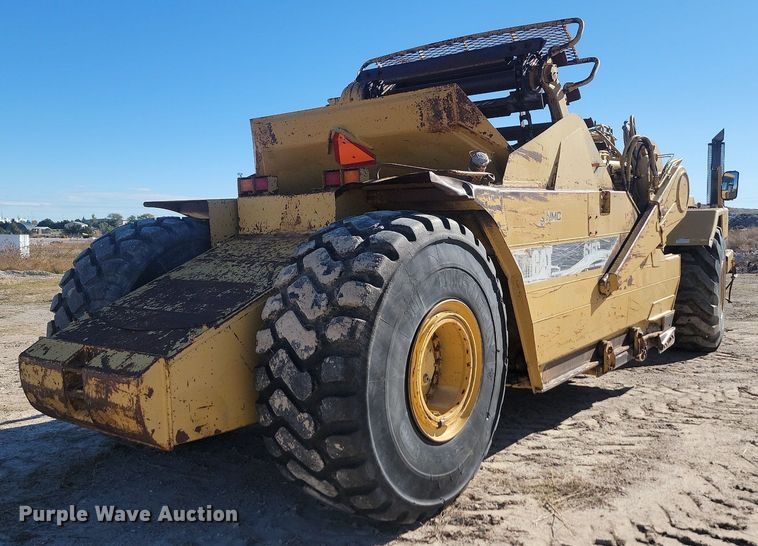 image for item JG9735 1999 Caterpillar 615C Series II  elevating scraper