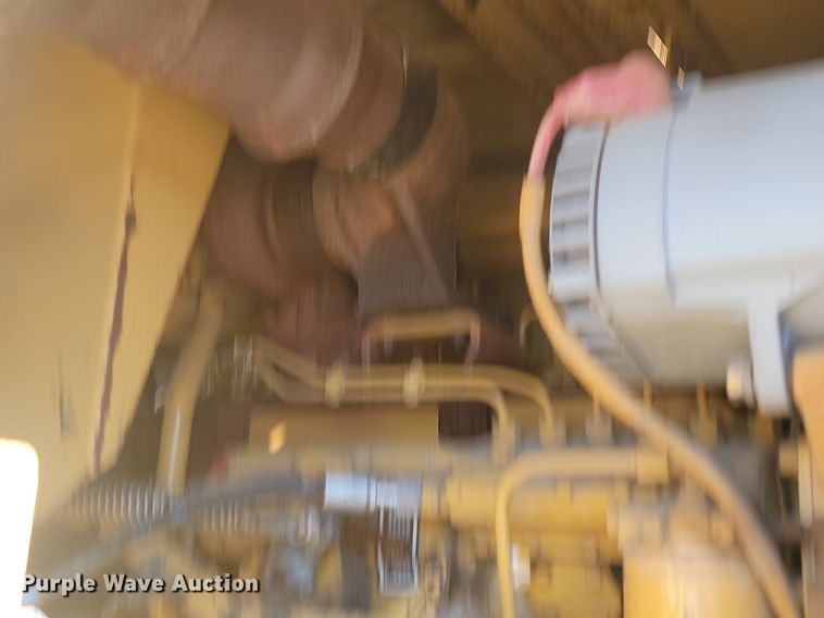 image for item JG9735 1999 Caterpillar 615C Series II  elevating scraper