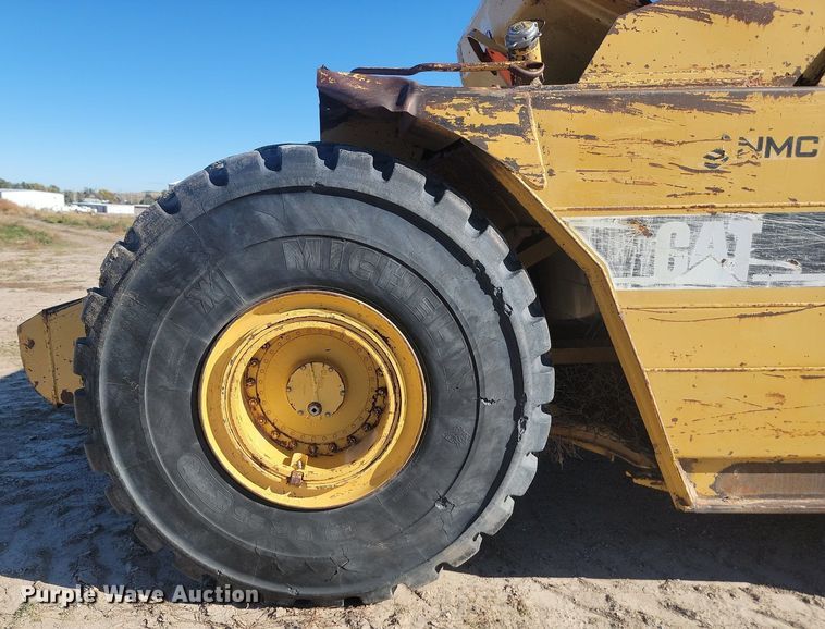 image for item JG9735 1999 Caterpillar 615C Series II  elevating scraper