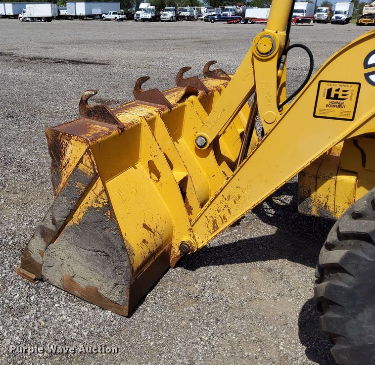 image for item KW9023 2004 John Deere 310SG  backhoe