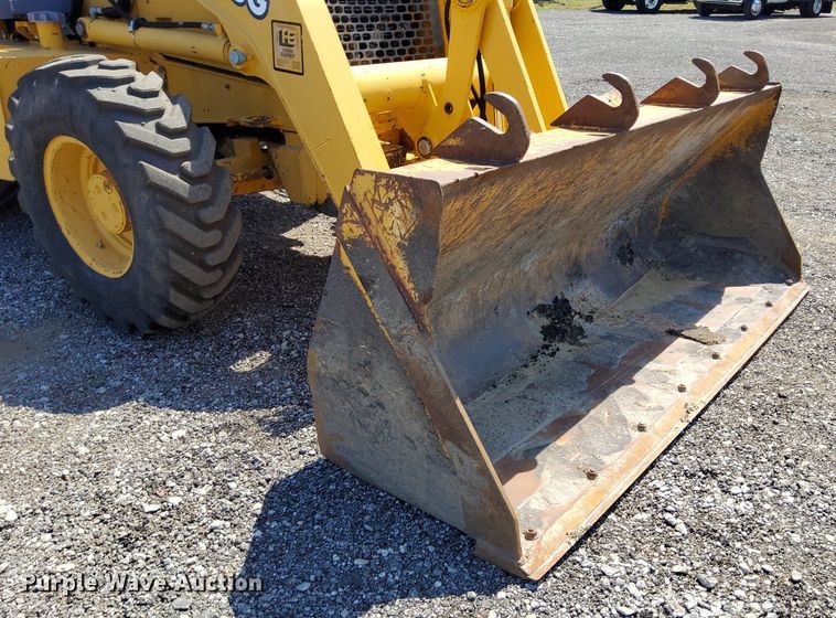 image for item KW9023 2004 John Deere 310SG  backhoe